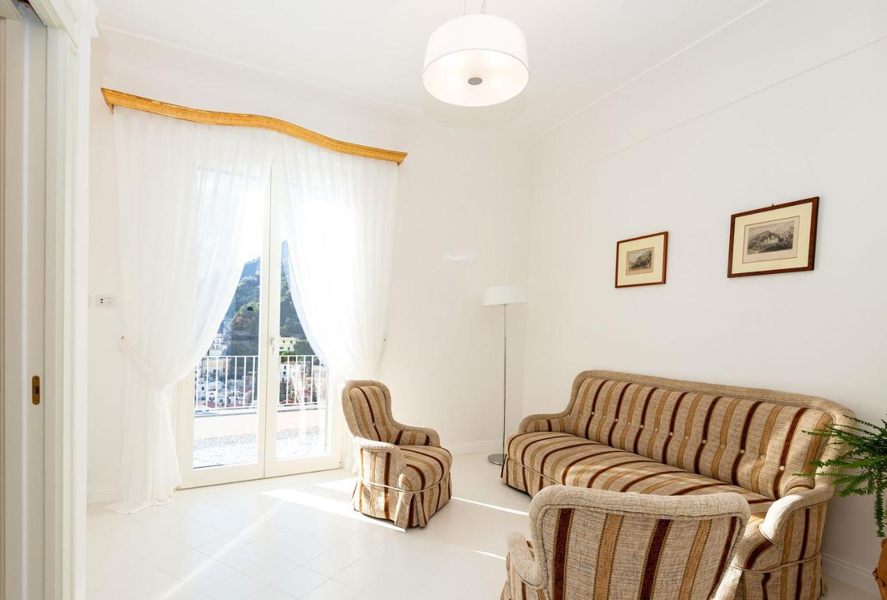Amore Rentals - Palazzo Della Storia Amalfi Buitenkant foto