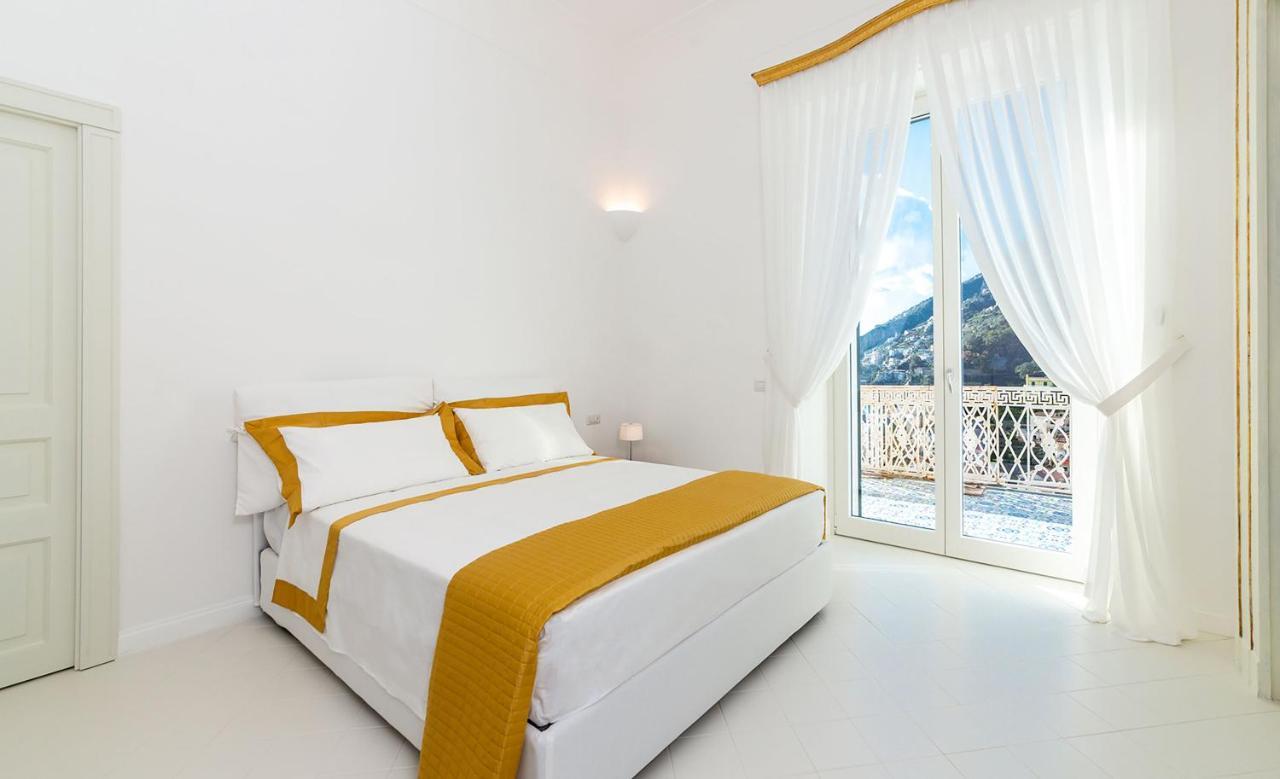 Amore Rentals - Palazzo Della Storia Amalfi Buitenkant foto