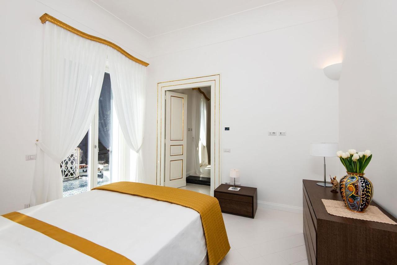 Amore Rentals - Palazzo Della Storia Amalfi Buitenkant foto